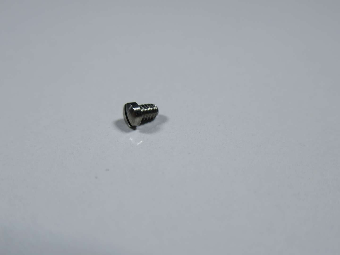 LENS HEAD SCREW M1,4X2