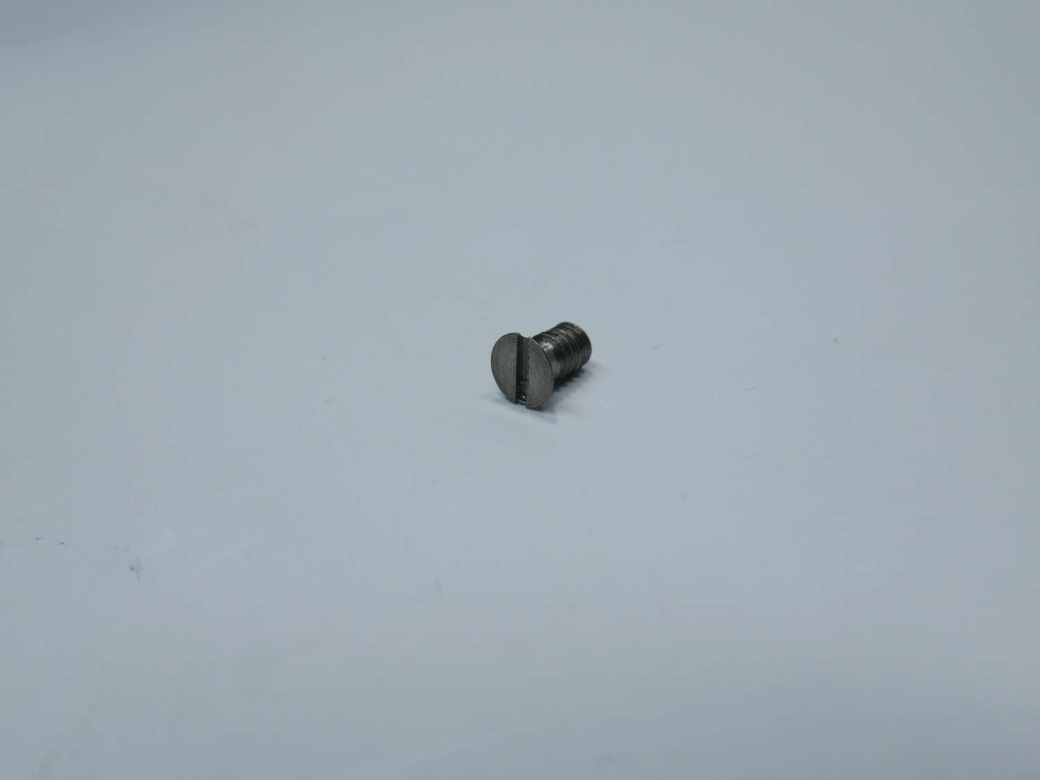 SLOTTED COUNTERS.FLAT HEAD SCREW M2X3,5